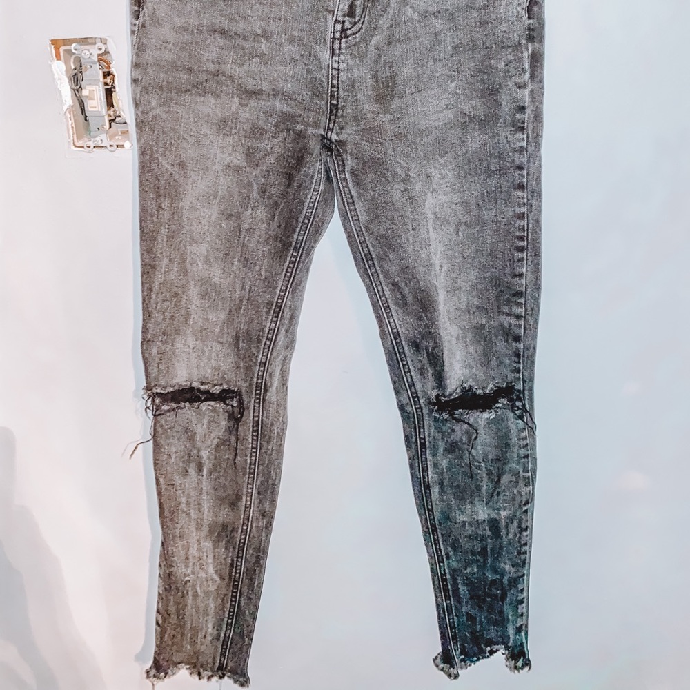 black ripped jeans